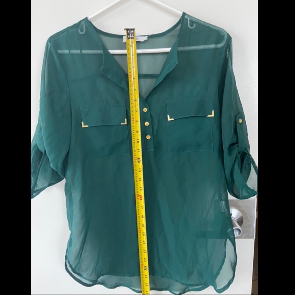 Like new Ricki’s blouse size 4 (worn once)